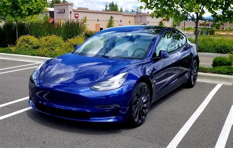 5 Blue Teslas