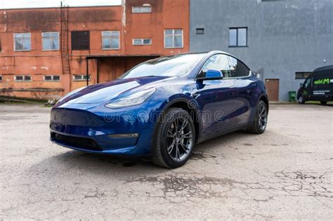 Self Driving Tesla Model Y Exterior Blue Metallic Black Titanium Rims Self Driving Tesla Model Y Exterior Blue Metallic Black Titanium Rims